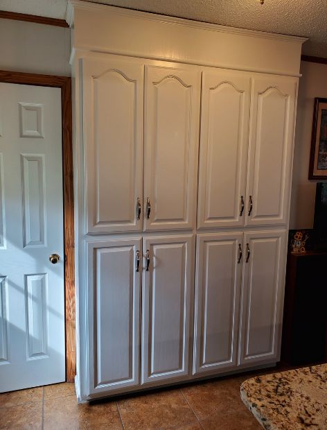white wooden tall cabinet in kitchen mcdonald tn